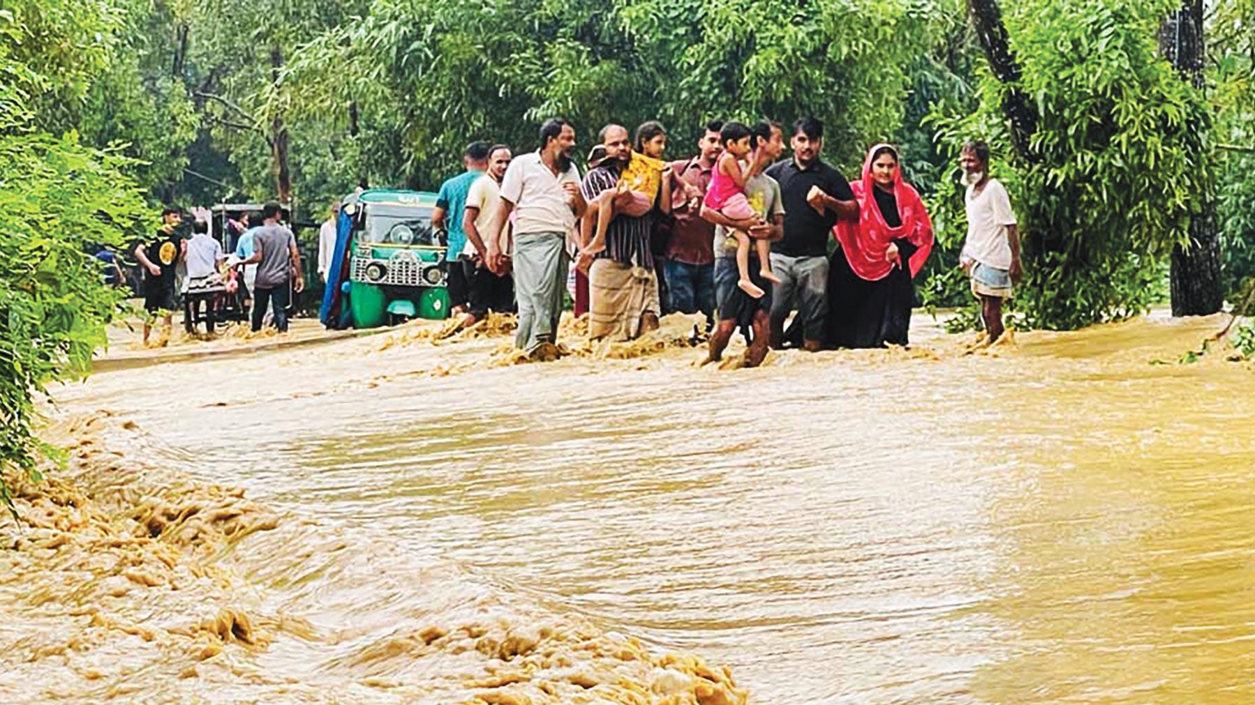 বন্যার্তদের পাশে দাঁড়াই