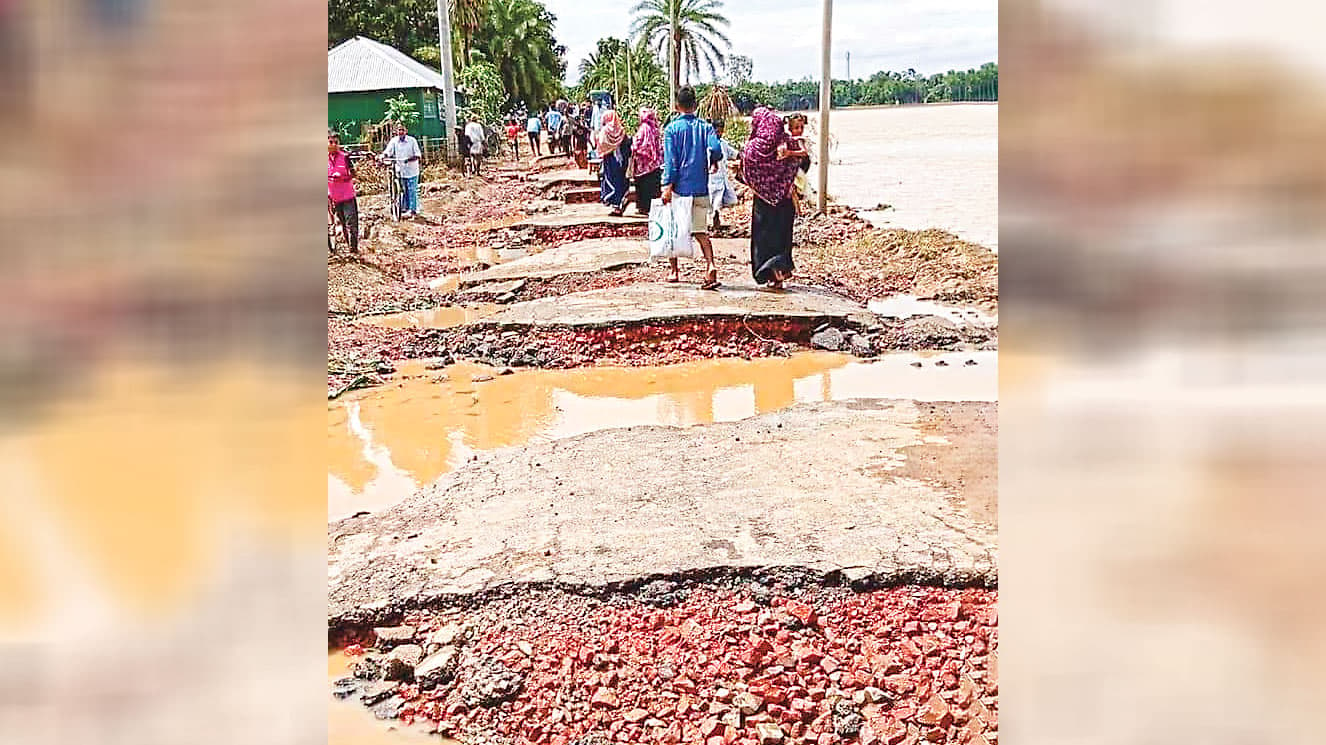 বন্যায় ছিন্নভিন্ন সড়ক ক্ষতিগ্রস্ত খামারিরা