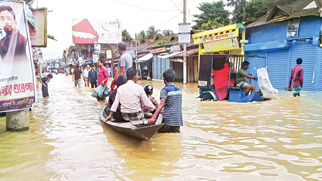 বানের ক্ষত বুকে নিয়ে জাগছে জনপদ