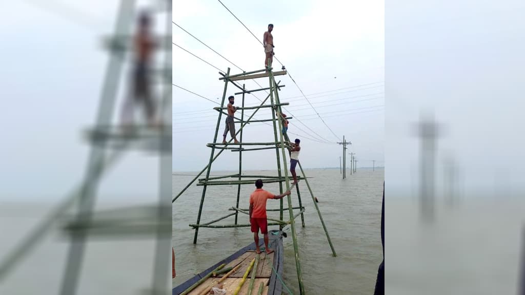 হাওরে বাঁশের খুঁটিতে ১১ কেভি বিদ্যুতের লাইন