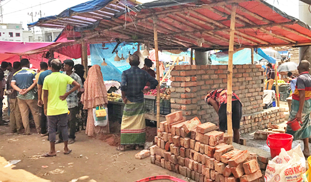 শেরপুরে সরকারি জমি দখল করে স্থাপনা নির্মাণ