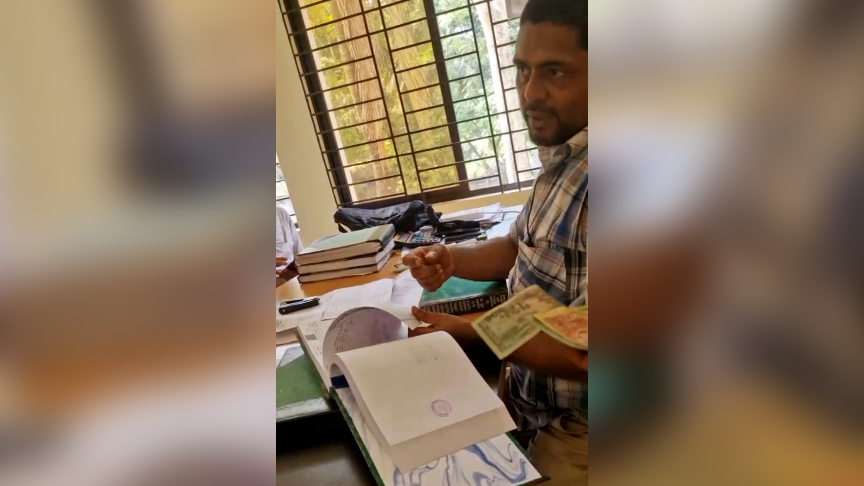 ঘুষ নেওয়ার ভিডিও ভাইরালের পর সেই ভূমি কর্মকর্তাকে বদলি
